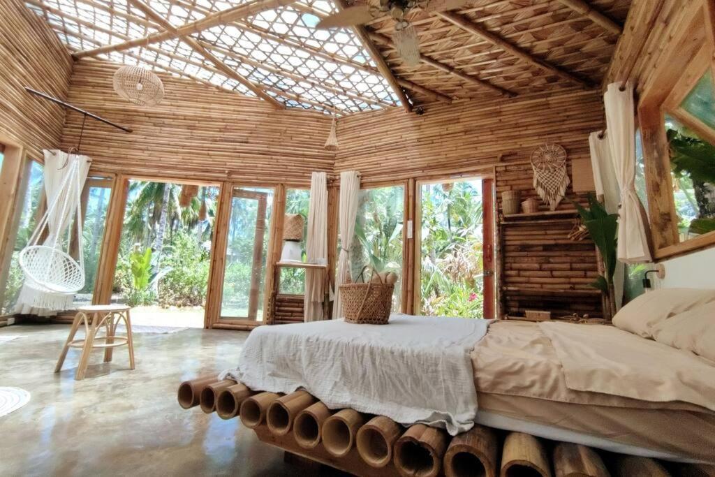 The Bamboo Houses - Tropical Garden & Empty Beach General Luna  Buitenkant foto